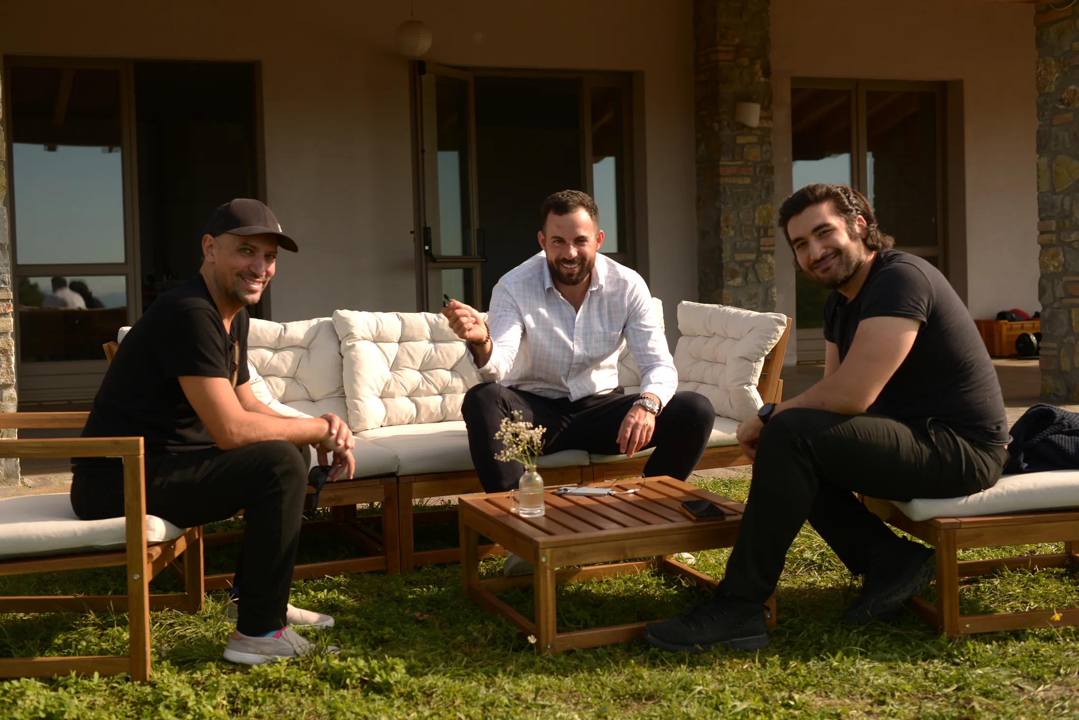 Villa Gaia participants talking together outside in the garden